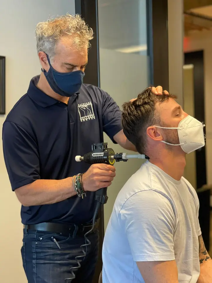 Instrument Adjustment at Peachtree Wellness Chiropractic Atlanta